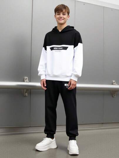 SHEIN 2pcs/Set Teens Boys Casual Daily Comfortable Letter Graphic Hooded Sweatshirt & Solid Color Sweatpants 2 Pieces Outfit Set Suitable For Kids Outfits Toddler Boy Clothes Back To School Boys Set Suitable For Birthday Parties, Evening Parties, Performances, Weddings, Baptisms, Opening Ceremonies Daily Suitable For Daily Use Suitable For School Suitable For Travel Suitable For Sports Thick Velvet Suitable For Autumn And Winter Teen Boys Sweatsuit Set Boys 2 Piece Hoodie And Sweatpants Set Boys Track Fall