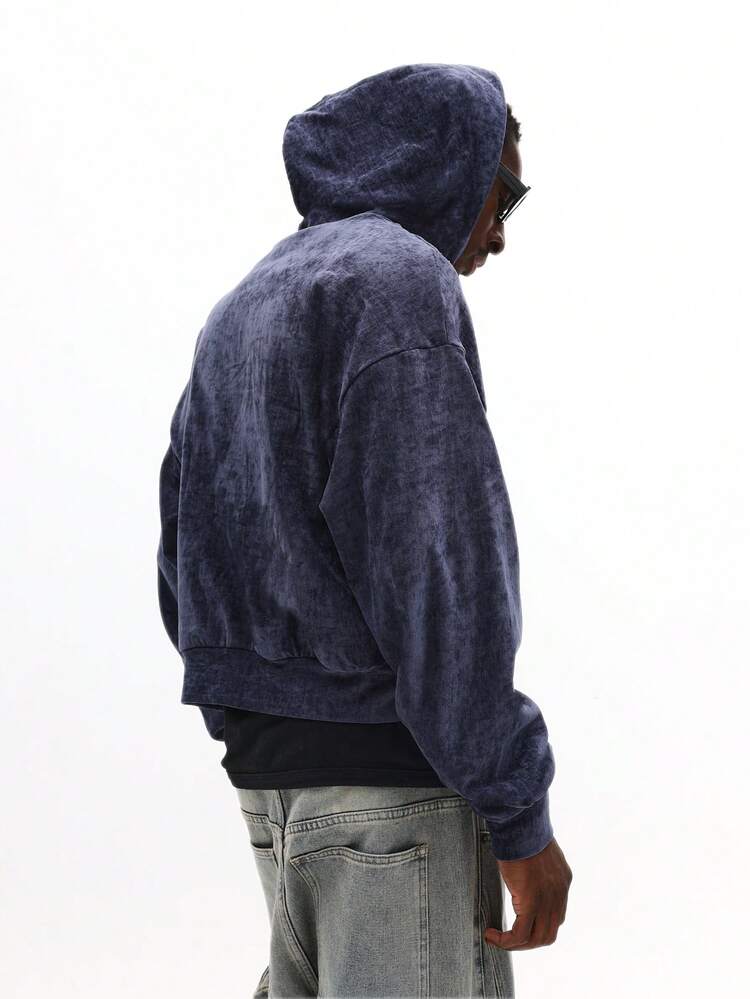 ドローストリングとウォッシュ加工が施されたベルベットのジップスルーパーカー