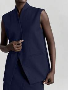 Ontre Bộ vest nữ phong cách đô thị mới mùa Xuân/Hè 2026, chất liệu vải chống nhăn, bao gồm áo blazer, áo vest và chân váy, trang phục công sở dáng rộng, trang phục thường ngày thoải mái dành cho nữ. - Màu xanh hải quân - Xem 2