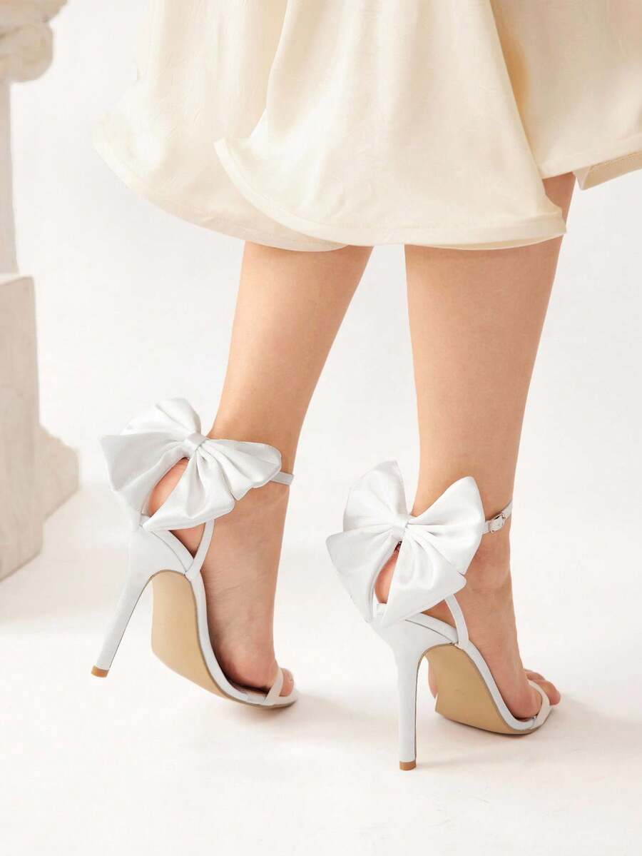 CUCCOO CHICEST 蝴蝶结装饰高跟时尚凉鞋适合派对活动新年假期