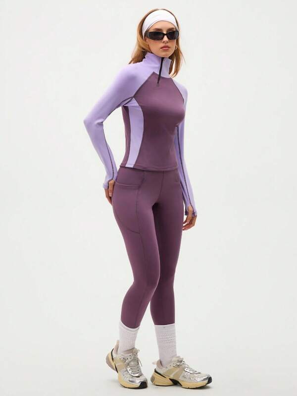 Eassivo Ensemble de sport pour femmes avec Top zippé à manches raglan et blocs de couleurs et leggings. Tenue d'extérieur