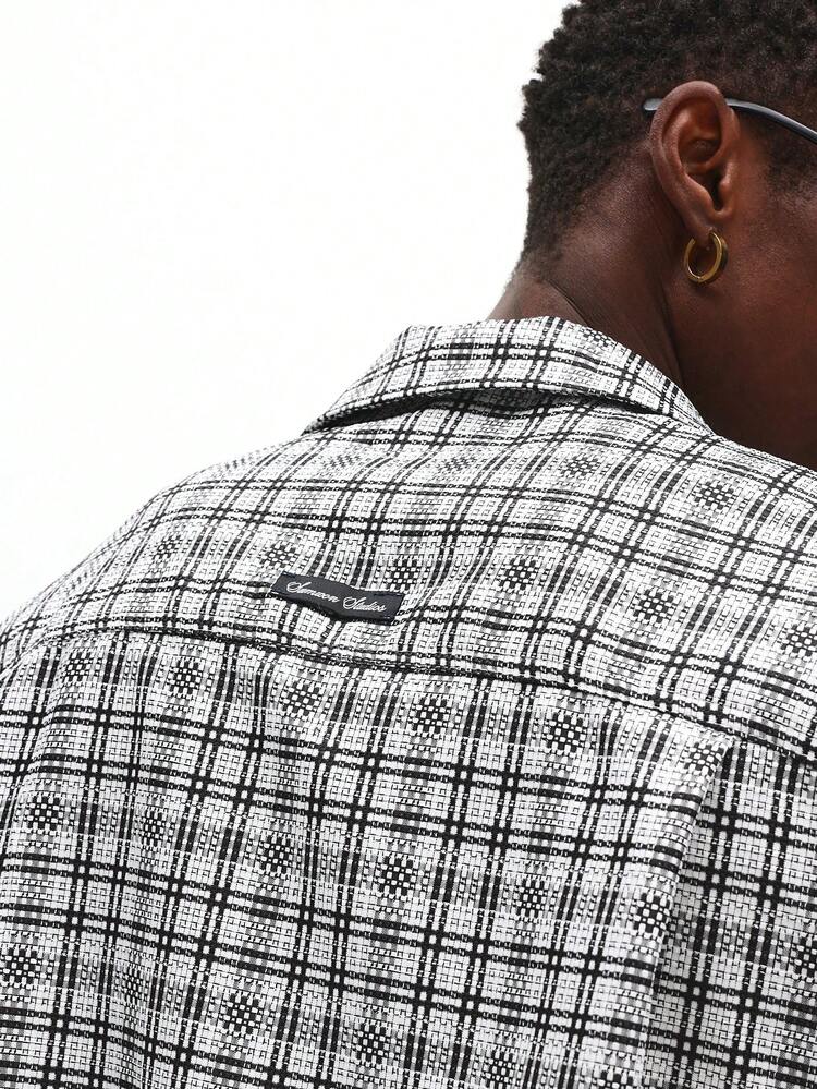 Camicia a quadri con bottoni e tasche sul petto