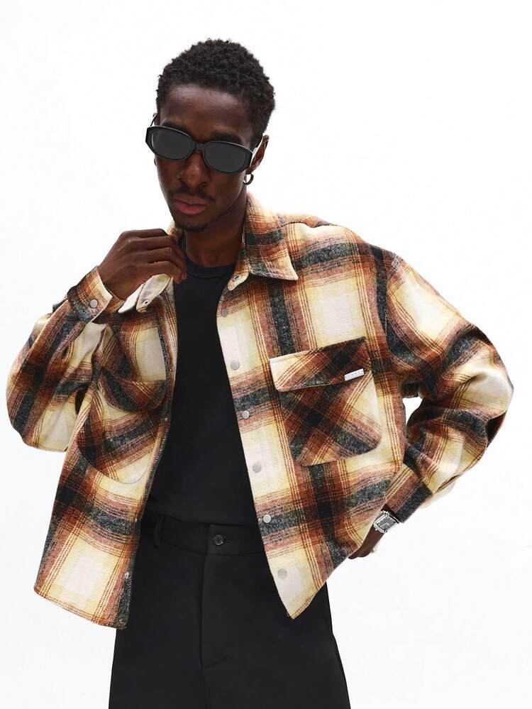 Camicia oversize in flanella scozzese con bottoni sul davanti