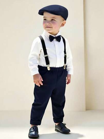 SHEIN 三件套男婴优雅绅士正装：白色长袖衬衫配蝴蝶结，松紧腰背带裤和绅士帽，时尚帅气，适合生日派对、晚宴、婚礼、婚礼宾客、花童、男傧相等场合，春秋季节穿着，是6个月至3岁男童的最佳选择，也是返校季、秋冬季的理想之选。