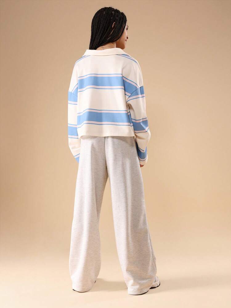 Set aus gestreiftem Poloshirt und Jogginghose mit weitem Bein