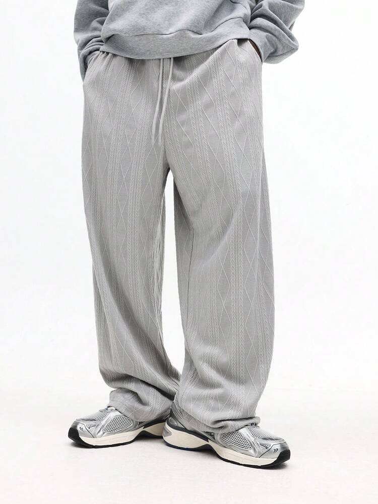 Calça reta com estampa de diamante texturizada e tornozelos elásticos