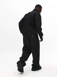 SUMWON Conjunto de dos piezas de ropa de calle informal de forro polar abrigador con sudadera con media cremallera y pantalón ancho de pierna - Negro - Ver 2
