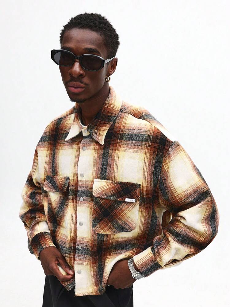 Camicia oversize in flanella scozzese con bottoni sul davanti