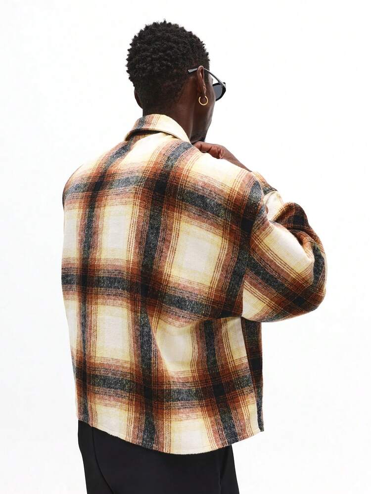 Camicia oversize in flanella scozzese con bottoni sul davanti