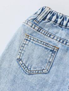 Snöflingetvättade, slitna, blommiga flockjeans med vida ben, 90-tal, moderiktiga för unga flickor