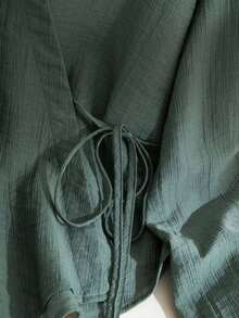 Modelyn Camisa casual de manga larga con cruce y nudo delantero en unicolor, talla grande