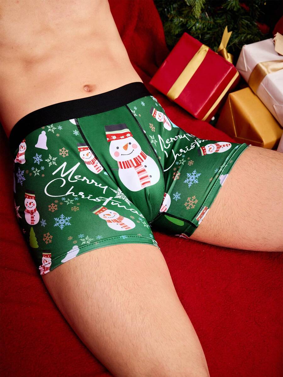 Notgurli Cuecas boxer de comprimento médio para homens com estampa engraçada de Papai Noel, caixa de presente, bengala de doce, sinos, flocos de neve, boneco de neve e família em festa de Natal - Verde - Visão 1