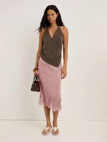 Nöista 这款优雅的女士半身裙饰有精致的蕾丝裙边，非常适合正式场合、派对装扮和精致的冬季造型；它是一款百搭单品，可轻松搭配衬衫或针织衫，为女性的冬季衣橱增添永恒的优雅气质，无论是休闲造型、优雅着装、圣诞节装扮还是精致的新年庆祝活动，都能完美驾驭。 - 藕粉色 - 查看 5