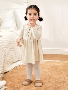 Cozy Pixies Robe longue pour bébé fille, en tricot unicolore, col rond doux, volants à l'ourlet, manches longues, taille marquée