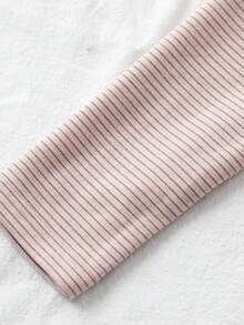 SHEIN 少女粉色纯色圆领修身休闲短款长袖T恤，适合冬季穿着，秋季上衣，节日、万圣节、圣诞节、新年皆宜，是圣诞礼物的理想之选。适合秋冬季日常休闲穿着和上学穿着，舒适保暖，是秋冬季居家休闲、街头风的理想选择。浅粉色可爱上衣 - 粉色 - 查看 3