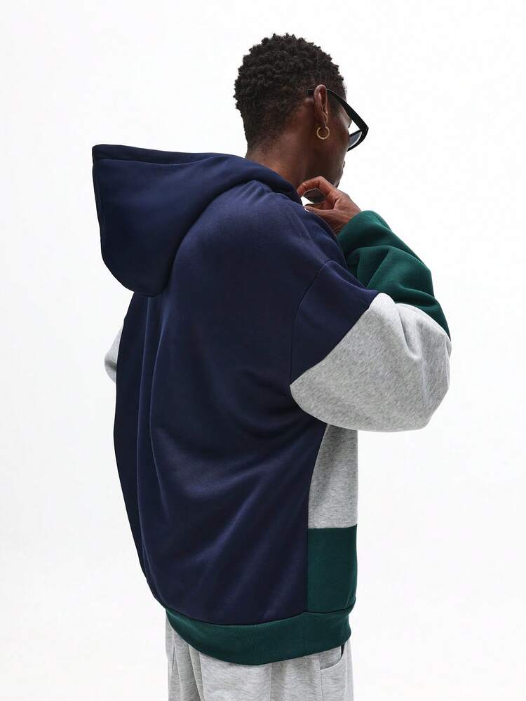 Bluza z kapturem i suwakiem w blokach kolorów z haftowanym logo