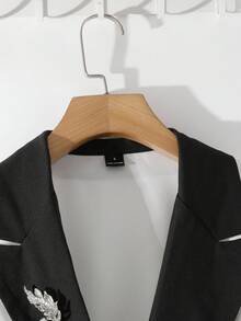 GlowEve Elegante traje de mujer de moda versátil para el invierno, con características como cuello de contraste negro y blanco de solapa grande, decoración de botones de strass, cinturón de cintura ceñida, chaqueta con bolsillos en forma de cono y pantalones de pierna entallada