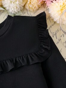 两件套女童针织荷叶边罗纹黑色T恤上衣搭配黑白格子褶皱蝴蝶结半裙，优雅时尚的春秋季儿童服装。 - 黑色 - 查看 6
