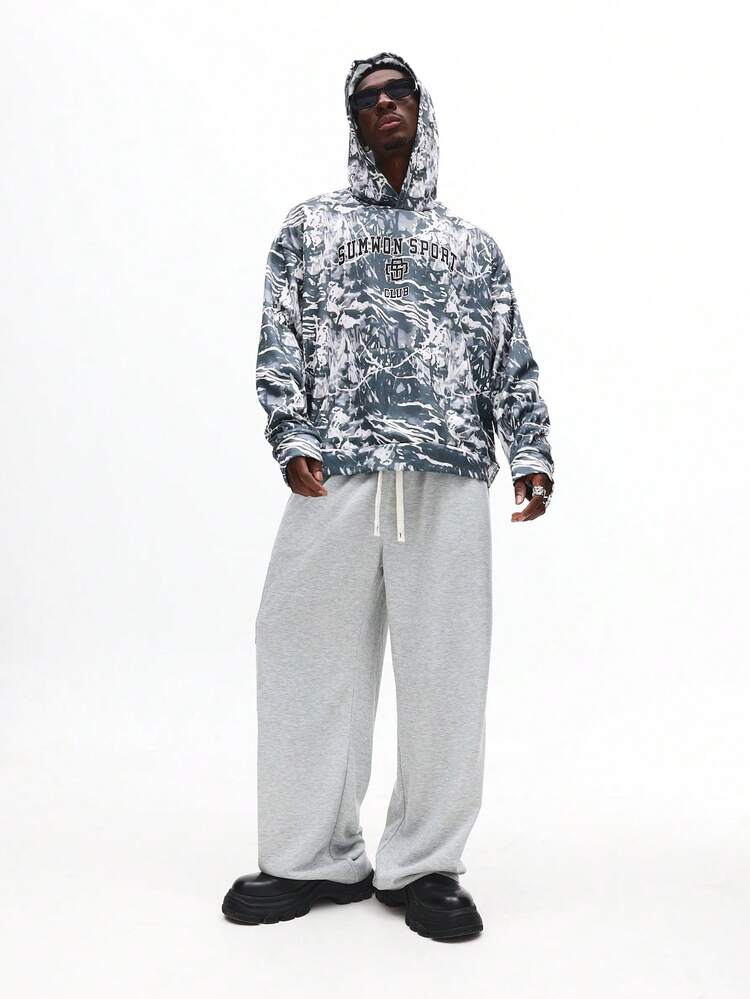 抽象的なマーブル模様のタイダイプルオーバーパーカー