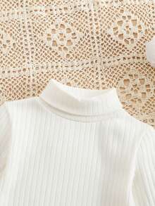 SHEIN 2pcs Baby Girl Knitted Black Long Sleeve Top And Plaid Elastic Waist Shorts Set, Autumn/Winter Autumn And Winter Two Piece Suit Girls Winter Outfit Sets Two Piece Winter Outfits For Toddler Girl Toddler Girl Skirt Set