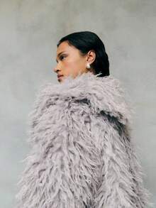 TypaGal Cozy And Glamorous, This Gray Jacket Features Plush Faux Fur With A Voluminous Texture For Warmth And Style. Perfect For Layering Over Evening Or Casual Outfits, This Gray Coat Adds Instant Luxury To Your Winter Wardrobe.
