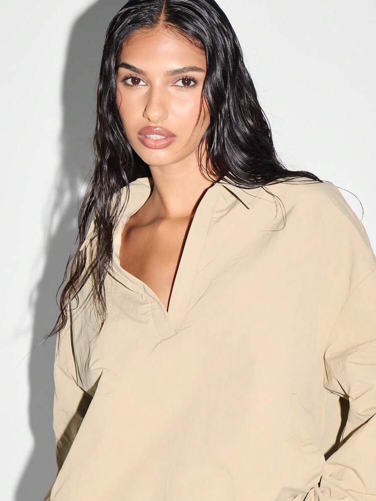 KIZN Nylon Collared Crop Blouse With Long Sleeves