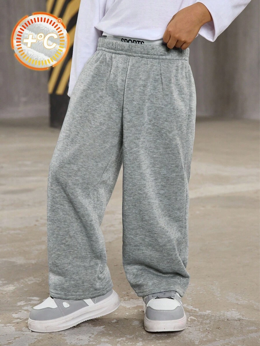 SHEIN Spodnie chłopięce w kolorze szarym, grube, termiczne, z szerokimi nogawkami, proste, w swobodnym stylu uniwersyteckim, na jesień/zimę