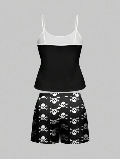 Goth Ensemble de pyjama short sans manches avec imprimé gothique d'étoiles et de crânes, en couleurs contrastées. Tenue de détente confortable pour les grandes tailles.