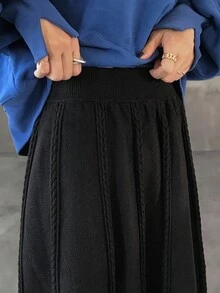 FRIFUL Falda maxi acampanada de punto holgada y versátil con cintura elástica de tela texturizada negra sólida, para otoño/invierno