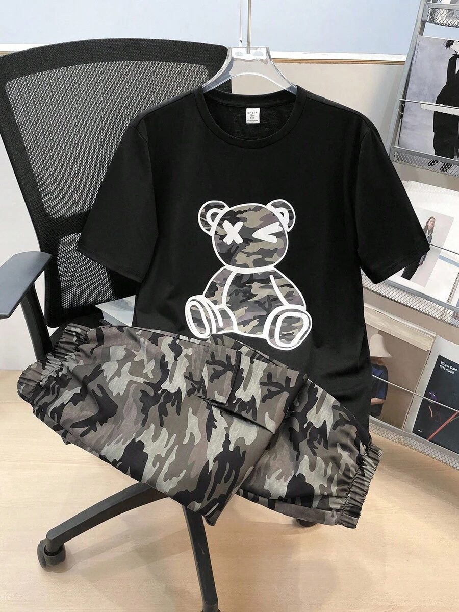 SHEIN Bộ 2 món cho bé trai tuổi teen, gồm áo thun ngắn tay in hình gấu rằn ri và quần cargo có túi cùng họa tiết rằn ri. - màu đen - Xem 1