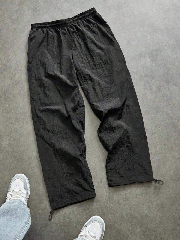 Manfinity Sport Corelite Pantalones de chándal casuales para hombres con cintura con cordón, ajuste holgado, estampado de letras, transpirables, que absorben la humedad, ligeros, cómodos, de pierna ancha, diseño minimalista, ajuste delgado para entrenamiento y ropa de gimnasio - Negro - Añade 2