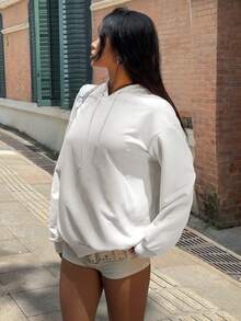 SHEIN EZwear Sudadera con capucha blanca de corte holgado con estampado de figura en verde y negro, de estilo minimalista y casual, para otoño/invierno