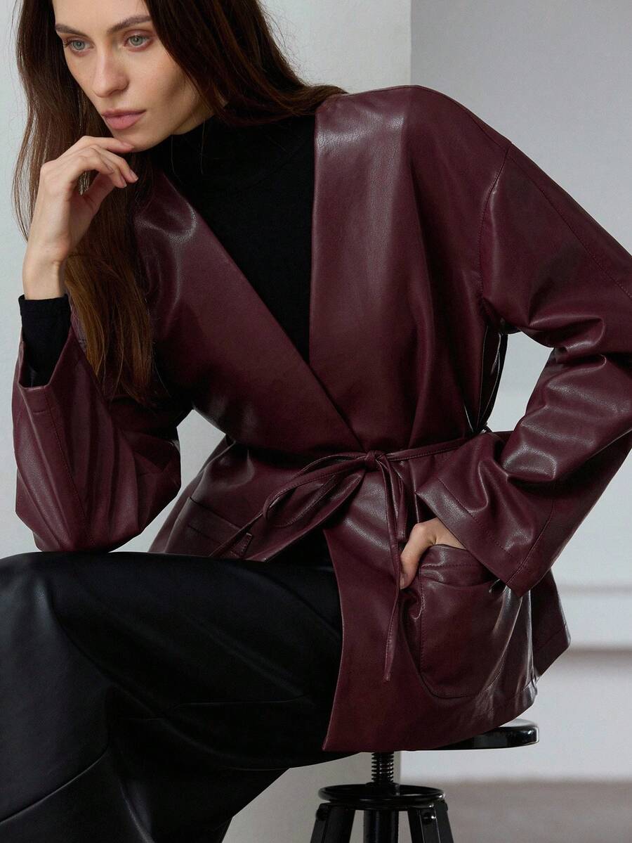 Aveloria Modichic Chaqueta de camisa de mujer de piel sintética sin cuello, de bolsillos con cinturón, de estilo elegante y moderno para uso diario