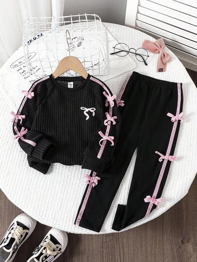 2 sztuki/zestaw: uroczy różowy T-shirt dla dziewczynek z nadrukiem w kokardki, rękawami typu raglan i legginsami z kokardką