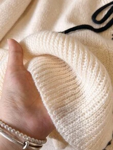 SHEIN Frenchy 女士法式休闲秋冬针织开衫，撞色刺绣滚边，前系带，荷叶边下摆和袖口，长袖，适合日常通勤。