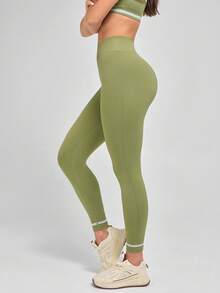 Fluxe Set de 2 piezas de ropa deportiva sin costuras y sin espalda con bloqueo de color (Top tipo camiseta corta y mallas) - Verde - Ver 4