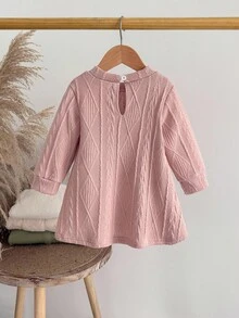 SHEIN Vestido casual suelto con cuello redondo, manga larga y decoración de lazo para niña bebé