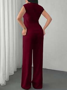 Two Pieces Sleeveless Knit Set Featuring Minimalist Crew Neck Top And High-Waisted Ribbed Pants In Soft Ivory - Burgundy - View 2