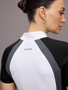 Activina Women's Color Block Raglan Sleeve Half Button Up Fitted Equestrian Jacket - Black and White - View 5