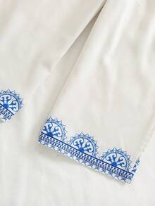 SHEIN Conjunto de 2 piezas de chaqueta de punto con estampado floral y pantalones casuales holgados para niña - Blanco - Ver 9