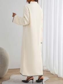 EURMUSE Elegant Cream Ribbed Knit Maxi Dress With Mock Neck And Subtle Black Contrast Wave Hem – Minimal Winter Statement Piece Elegant Cream Rib Knit Maxi Sweater Dress With Contrast Trim And Belted Waist For Minimal Chic Fall Looks - Beige - View 5