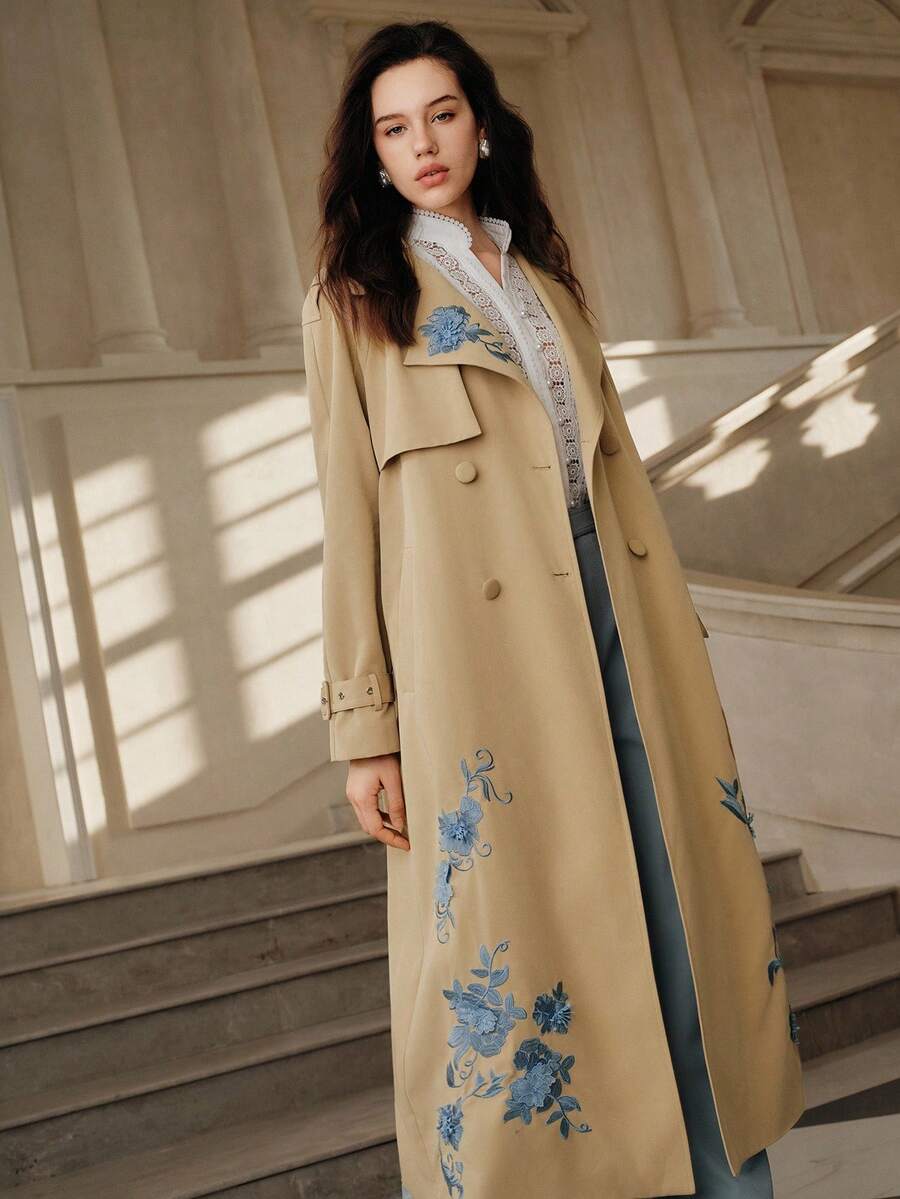 Anewsta Savoree Solid Color Contrast Asymmetrical Floral Embroidered Handmade 3D Flower Lapel Raglan Sleeve Belted Long Trench Coat