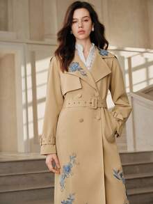 Anewsta Savoree Solid Color Contrast Asymmetrical Floral Embroidered Handmade 3D Flower Lapel Raglan Sleeve Belted Long Trench Coat