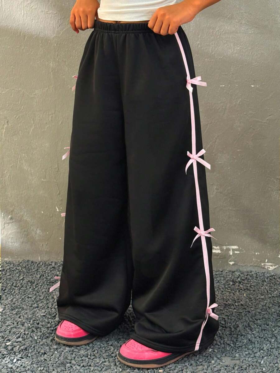 SHEIN Dziewczęce spodnie dresowe z kokardą i paskiem po bokach