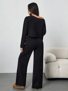 Flirla Set de 2 piezas de top holgado y pantalones de pierna ancha asimétricos de hombro sexy de estilo casual para otoño/invierno - Negro - Ver 2