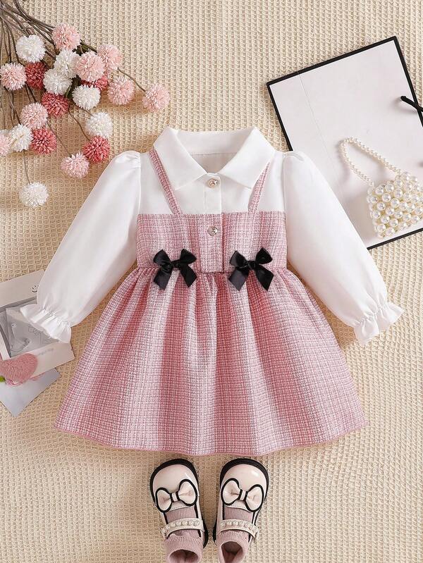 Souflis Souflis فستان بناتي مع طوق وأكمام منتفخة 2 في 1 بتصميم A-line. تصميم A-line كلاسيكي مناسب لجميع أنواع أجسام الأطفال الرضع. التصميم المميز للطوق يضيف لمسة من الرسمية، بينما المعالجة الذكية للأكمام المنتفخة تضفي طابعًا حلوًا وممتعًا. التصميم 2 في 1 يخلق عمقًا بصريًا. سواء للخروج أو الارتداء المنزلي اليومي، يمكن لهذا الفستان أن يبرز الطبيعة الحيوية والجذابة لطفلك الصغير.