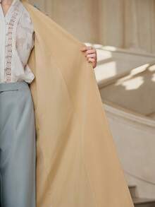 Anewsta Savoree Solid Color Contrast Asymmetrical Floral Embroidered Handmade 3D Flower Lapel Raglan Sleeve Belted Long Trench Coat