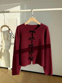 Comfortcana 秋冬大码女式蝴蝶装饰镂空设计长袖时尚套头衫