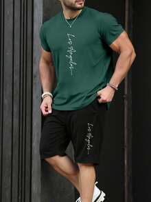 Manfinity Homme Handgeschriebene Schrift Lässig Muster Herren Standard Größe olivgrünes Kurzarm T-Shirt und schwarze Shorts Set