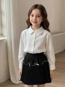 تنورة مبرمجة مزينة بفيونكة سوداء للبنات الصغيرات، بتصميم بسيط وجميل، من الأقمشة الناعمة والمريحة، مناسبة للاستخدام اليومي والخارجي والسفر والعطلات والمنزل وحضانة الأطفال في فصلي الخريف والشتاء، وأيضًا لحفلات عيد الميلاد والعودة للمدرسة والحفلات، وتناسب جميع الملابس